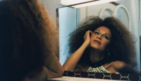 Woman with Afro in Mirror