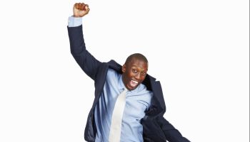 Happy business man jumping