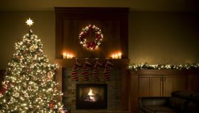 Adorned Christmas Tree, Wreath, and Garland Inside Living Room, Copyspace