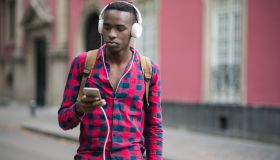 African teenager using mobile phone