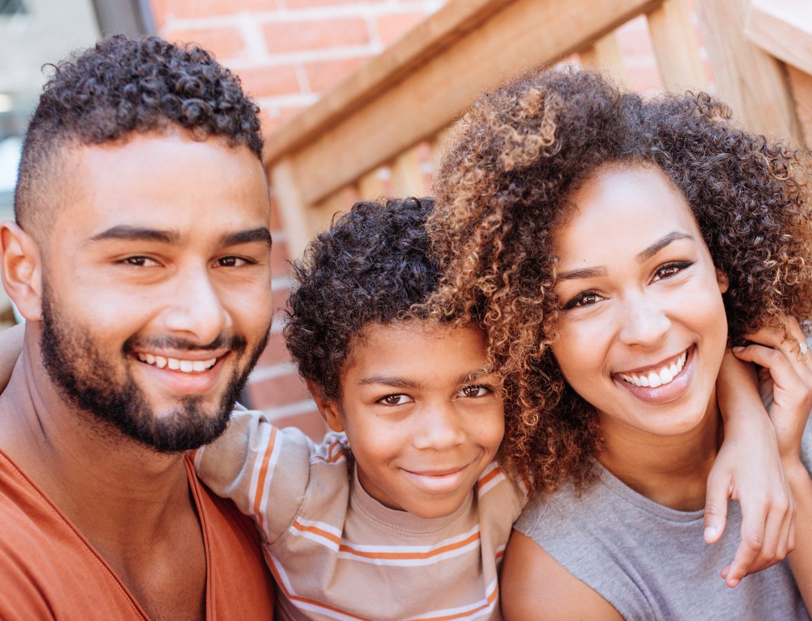 Happy family of three