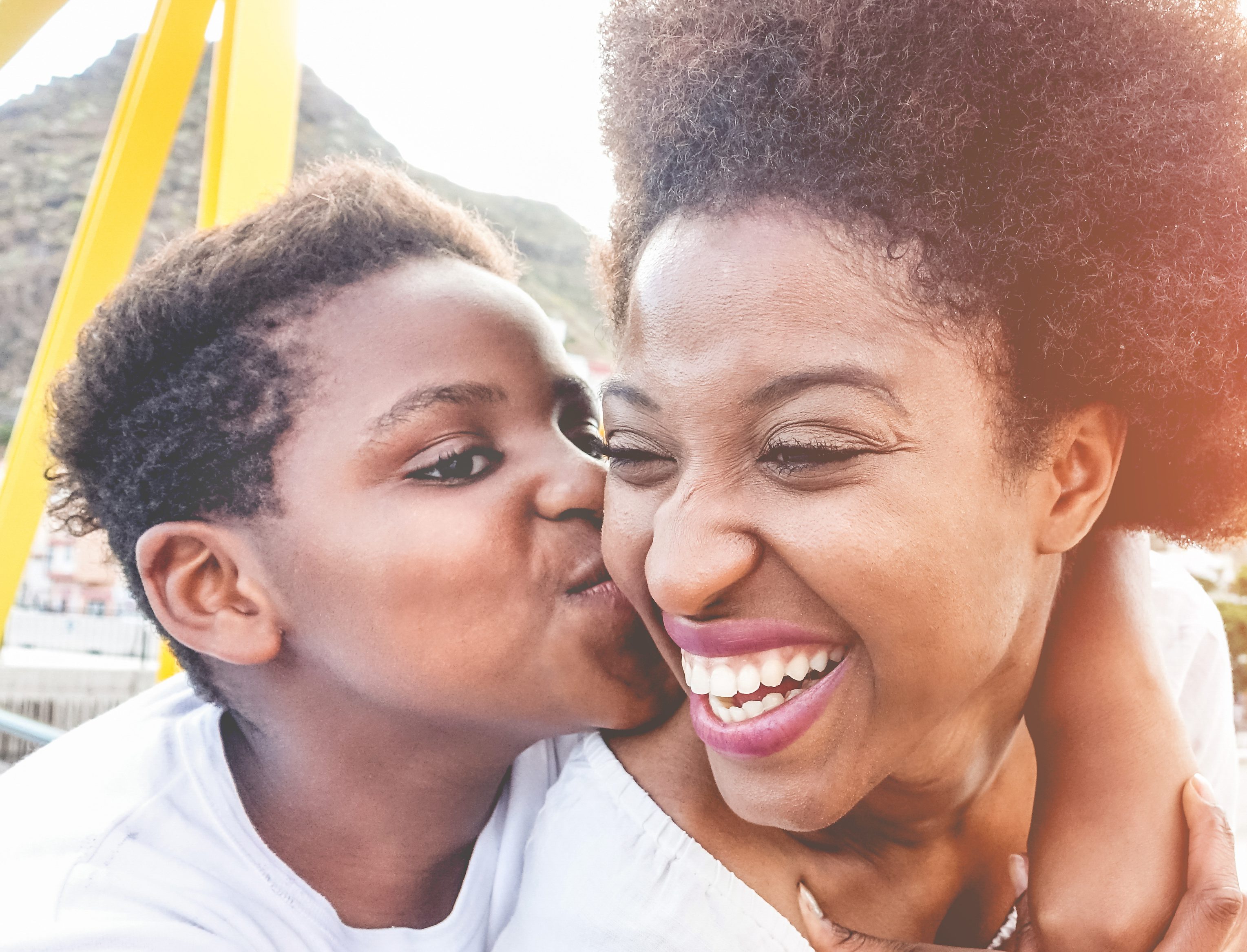 Boy Kissing Mother