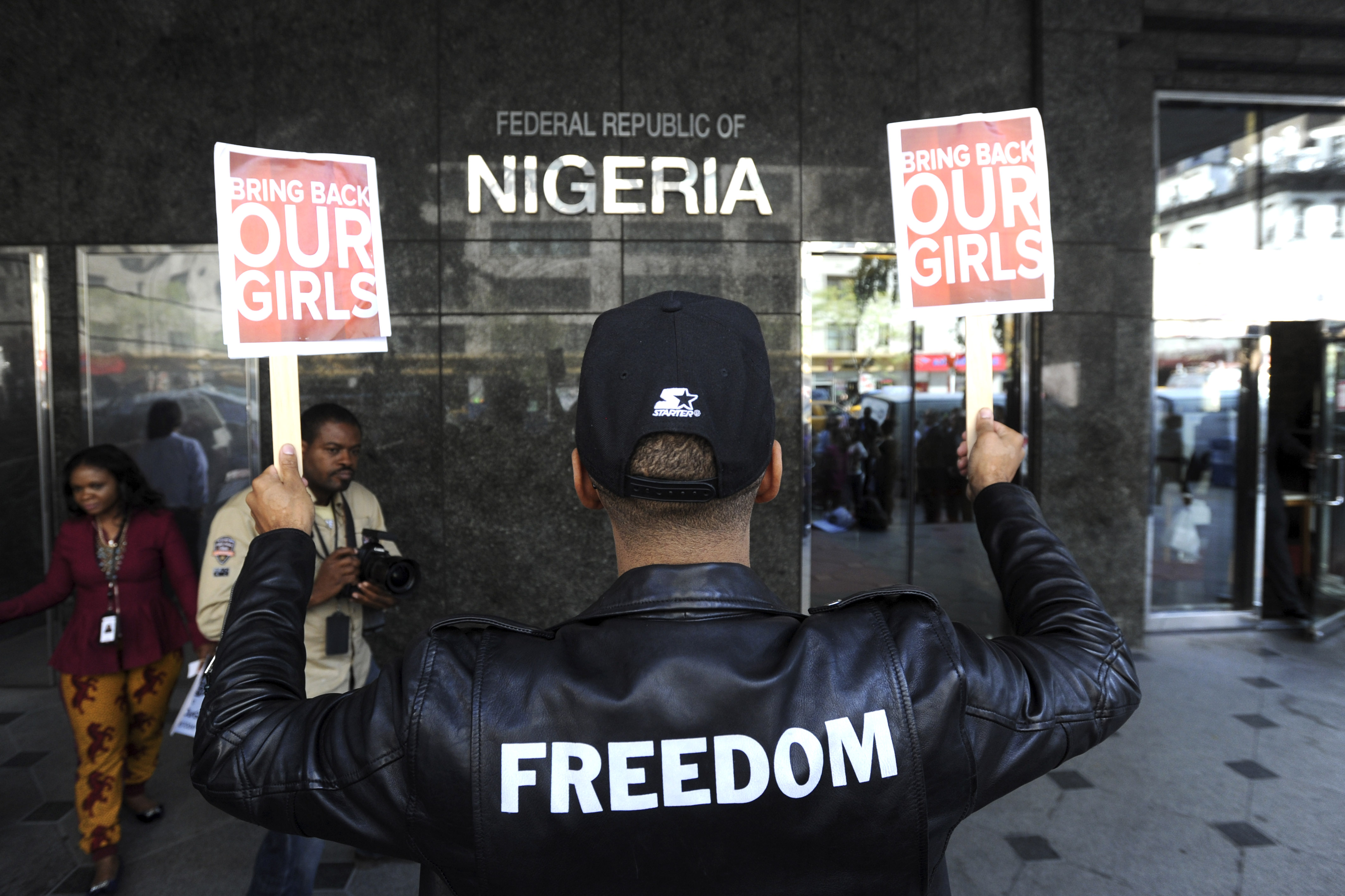 Alicia Keys and husband, producer-rapper Swizz Beatz hold a protest outside the Nigerian Consulate