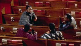 Young Men Talking With Pastor