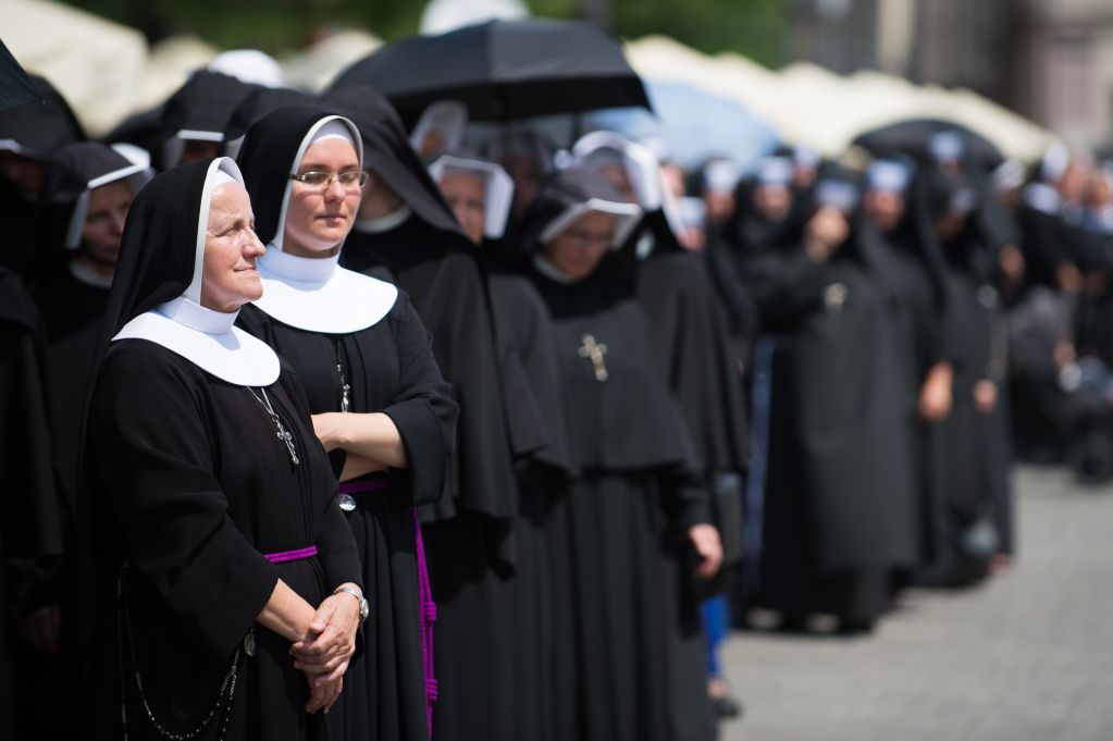 Nuns are seen during the Corpus Christi procession in Krakow...