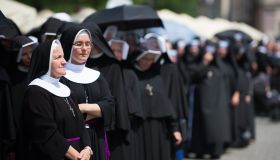 Nuns are seen during the Corpus Christi procession in Krakow...