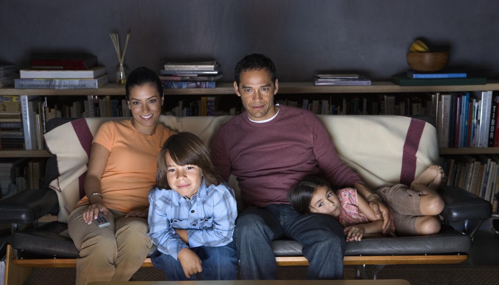 Family watching television together