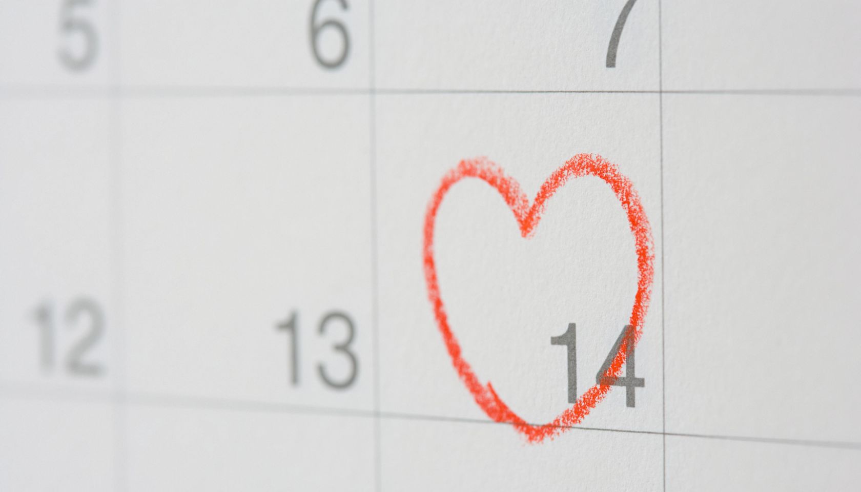 Number fourteen with a heart round it