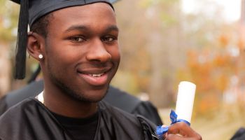 African descent college student at college graduation.