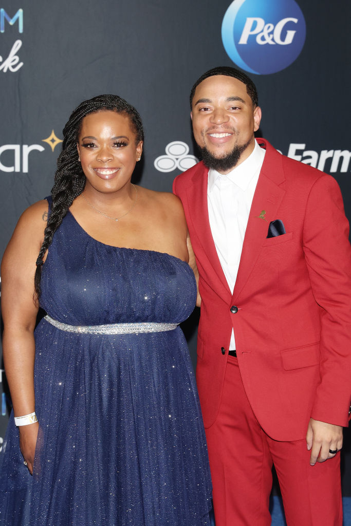 Jonathan Anderson (R) and a guest