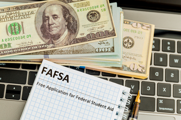 Fafsa. Student aid application form on the tablet.