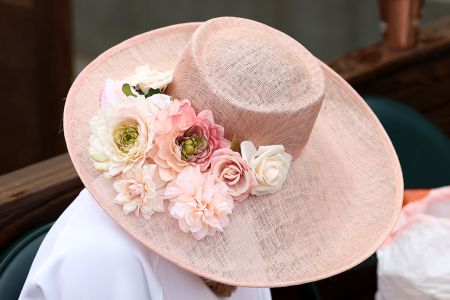 A woman attends Kentucky Derby 151 at Churchill Downs