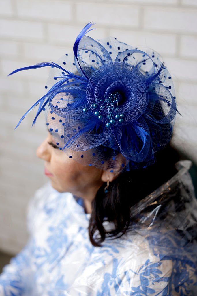 A woman attends Kentucky Derby 151 at Churchill Downs