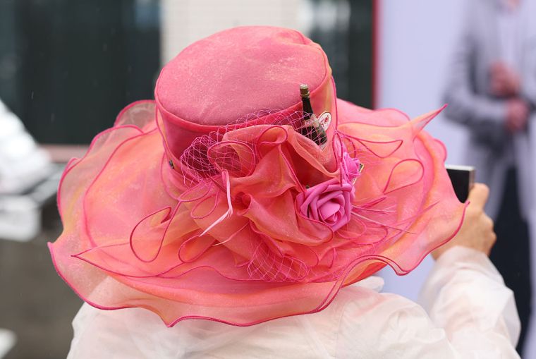 A woman attends Kentucky Derby 151 at Churchill Downs