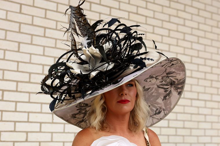 A woman attends Kentucky Derby 151 at Churchill Downs