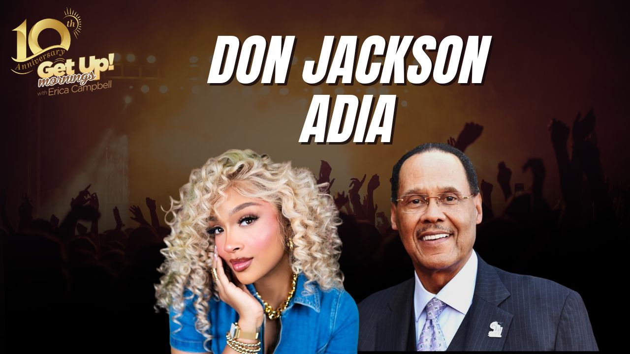 Don Jackson and Adia, a man and woman smiling and posing together on a stage or event backdrop.